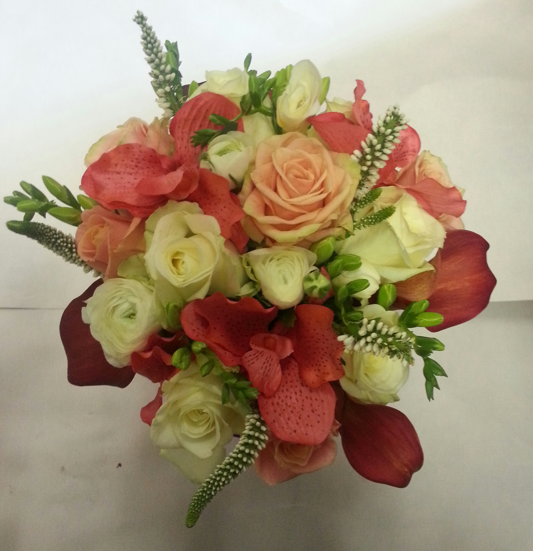 Coral and ivory bridesmaids bouquet