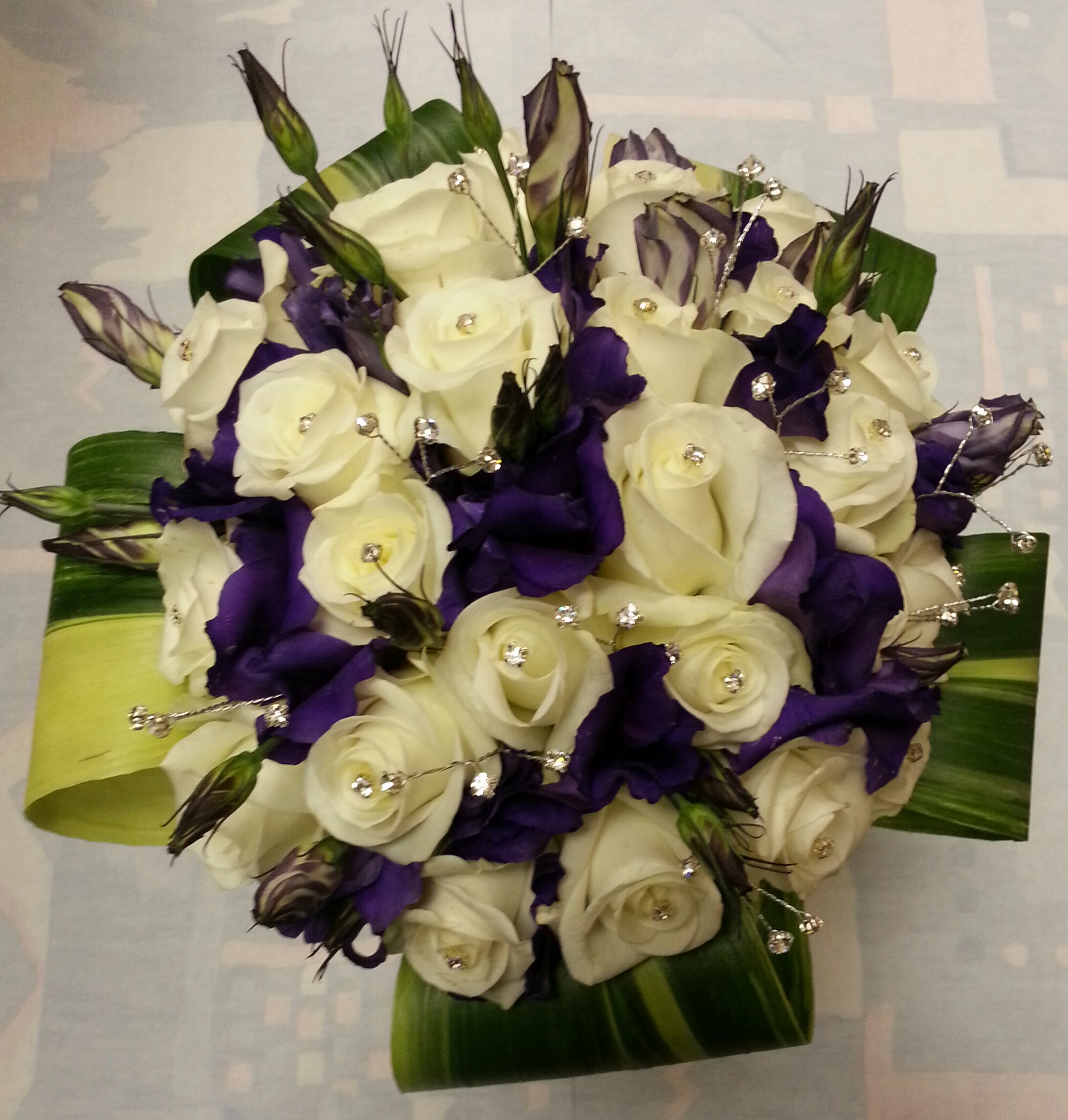 Compact lizzanthus and rose bouquet