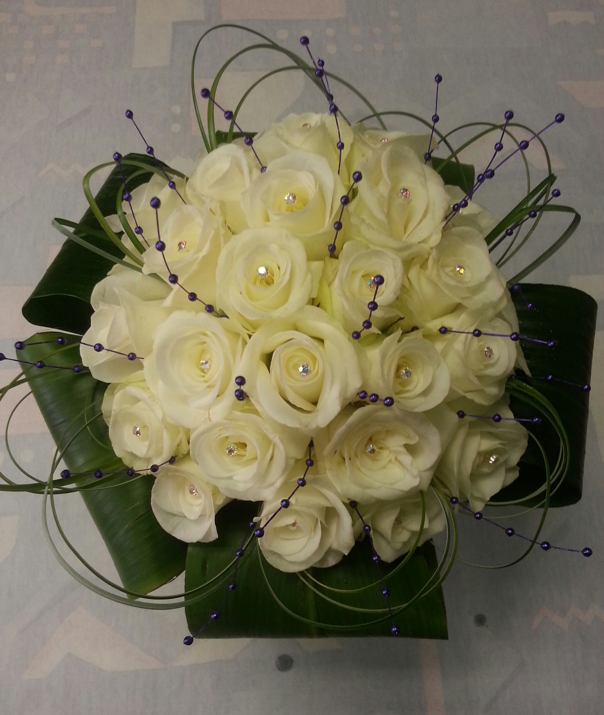 Rose compact with purple string pearls